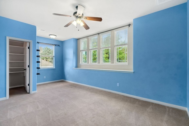 7820 Oteka Cv, Austin, TX 78735 - carpeted spare room featuring ceiling fan and baseboards