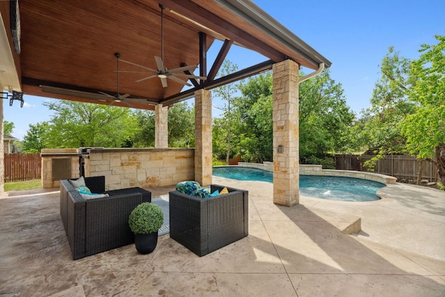 7820 Oteka Cv, Austin, TX 78735 - fenced backyard featuring ceiling fan, a patio, and an outdoor hangout area