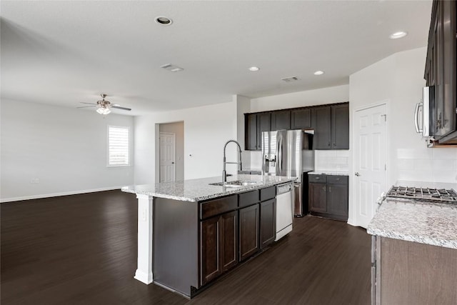 825 Fortrose Ter, Pflugerville, TX 78660 - kitchen featuring a sink, stainless steel appliances, dark wood-type flooring, ceiling fan, and recessed lighting