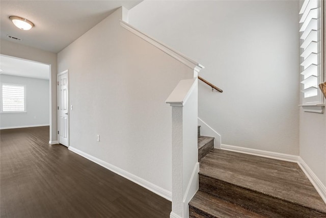 825 Fortrose Ter, Pflugerville, TX 78660 - staircase with wood finished floors and baseboards