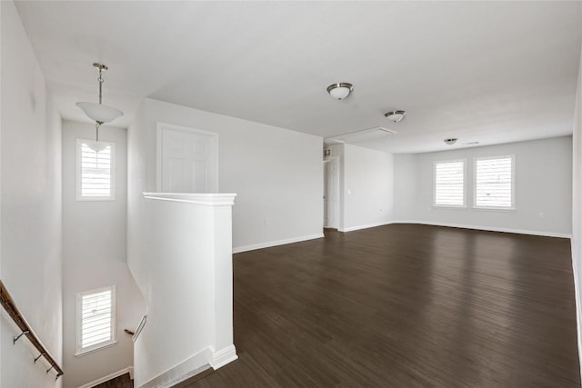 825 Fortrose Ter, Pflugerville, TX 78660 - unfurnished room featuring dark wood-type flooring and baseboards