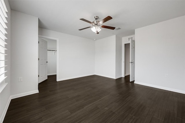 825 Fortrose Ter, Pflugerville, TX 78660 - empty room with a ceiling fan, dark wood-style flooring, and baseboards