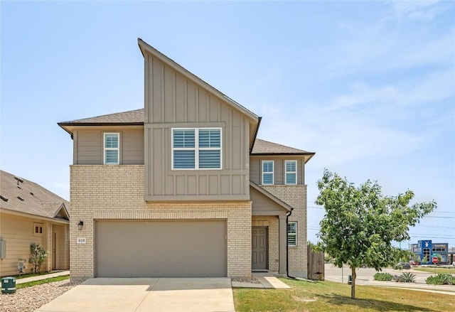 825 Fortrose Ter, Pflugerville, TX 78660 - view of front of house featuring board and batten siding, brick siding, an attached garage, and driveway