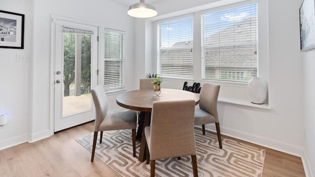 30 Stone Terrace Dr, Austin, TX 78734 - dining room with light wood-style flooring and baseboards
