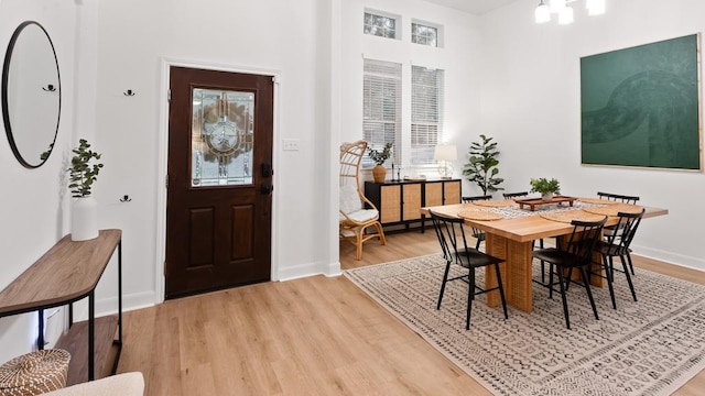 30 Stone Terrace Dr, Austin, TX 78734 - dining space with light wood-style floors, baseboards, and healthy amount of natural light