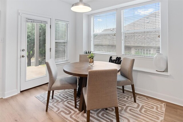 30 Stone Terrace Dr, Austin, TX 78734 - dining area with light wood-style flooring and healthy amount of natural light