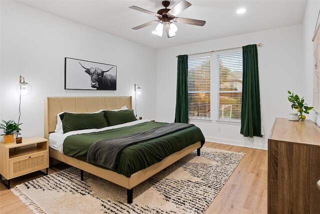30 Stone Terrace Dr, Austin, TX 78734 - bedroom with light wood finished floors and ceiling fan