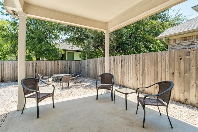 161 Serene Hollow Ln, Buda, TX 78610 - fenced backyard featuring a patio area