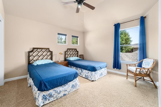 161 Serene Hollow Ln, Buda, TX 78610 - carpeted bedroom featuring baseboards, lofted ceiling, and a ceiling fan