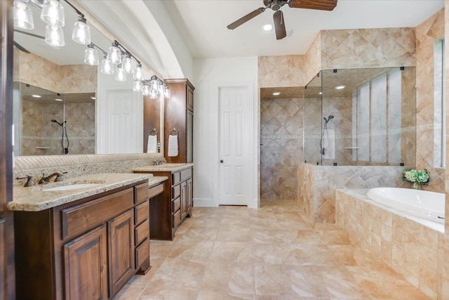 1016 Santaluz Path, Austin, TX 78732 - full bathroom with walk in shower, a garden tub, vanity, and ceiling fan