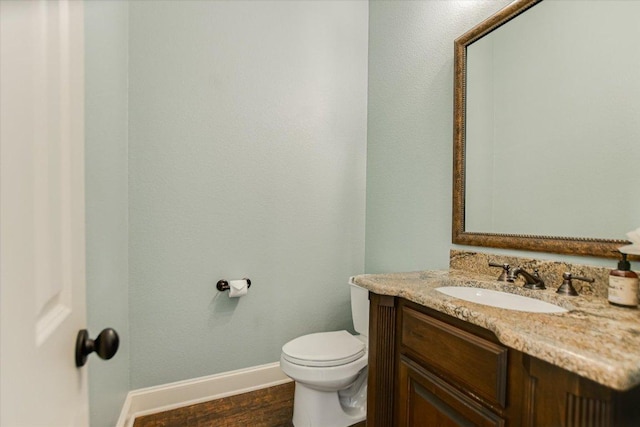 1016 Santaluz Path, Austin, TX 78732 - half bathroom featuring vanity and wood finished floors