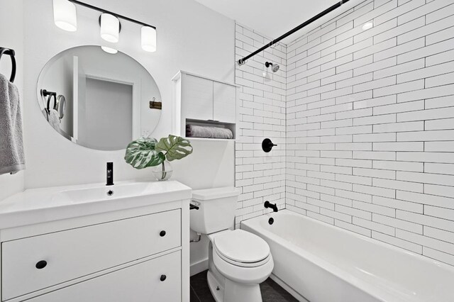 3415 Clarksburg Dr, Austin, TX 78745 - bathroom with vanity, toilet, and shower / washtub combination