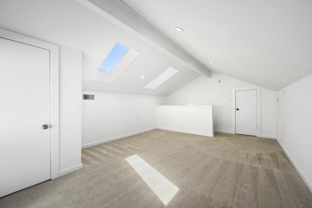 3415 Clarksburg Dr, Austin, TX 78745 - bonus room featuring a skylight, light colored carpet, baseboards, and recessed lighting