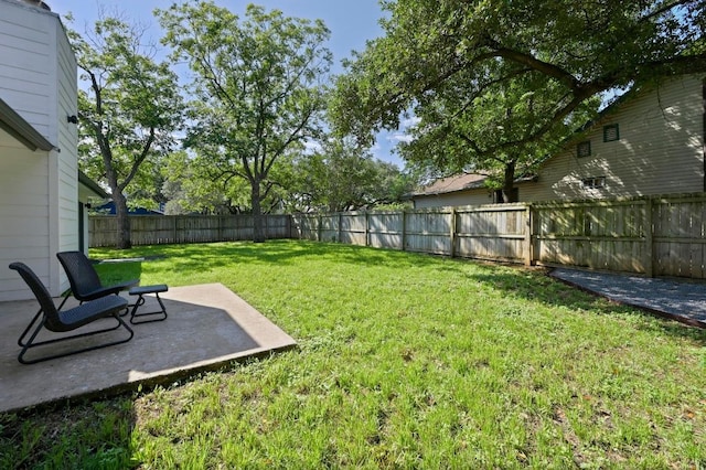 3415 Clarksburg Dr, Austin, TX 78745 - fenced backyard with a patio area