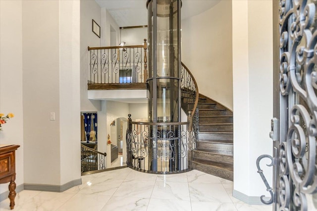 427 Bella Montagna Cir, Austin, TX 78734 - entryway with marble finish flooring and baseboards