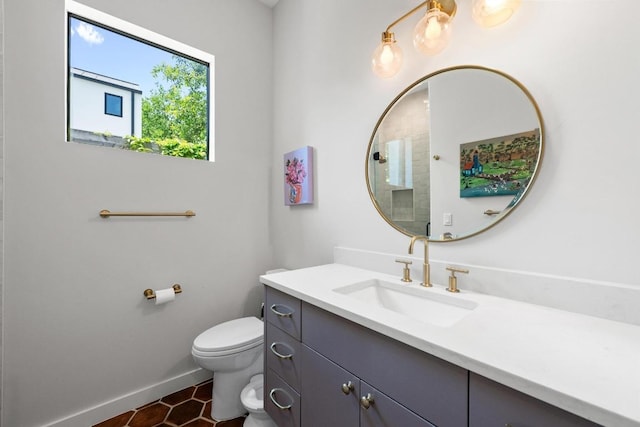 2024 Ford St, Austin, TX 78704 - full bathroom with vanity, toilet, and baseboards