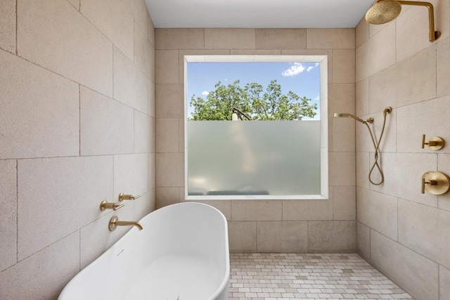 2024 Ford St, Austin, TX 78704 - bathroom featuring tiled shower and a freestanding tub