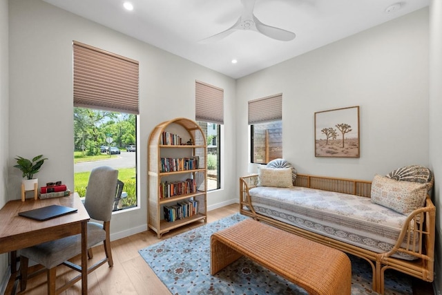 2024 Ford St, Austin, TX 78704 - living area featuring light wood-style floors, a ceiling fan, recessed lighting, a desk, and baseboards