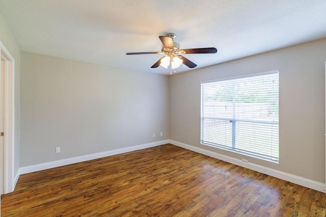 1307 Rambling Cv, Cedar Park, TX 78613 - unfurnished room featuring baseboards, wood finished floors, and a ceiling fan