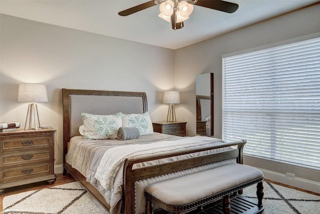1307 Rambling Cv, Cedar Park, TX 78613 - bedroom with baseboards, a ceiling fan, and multiple windows