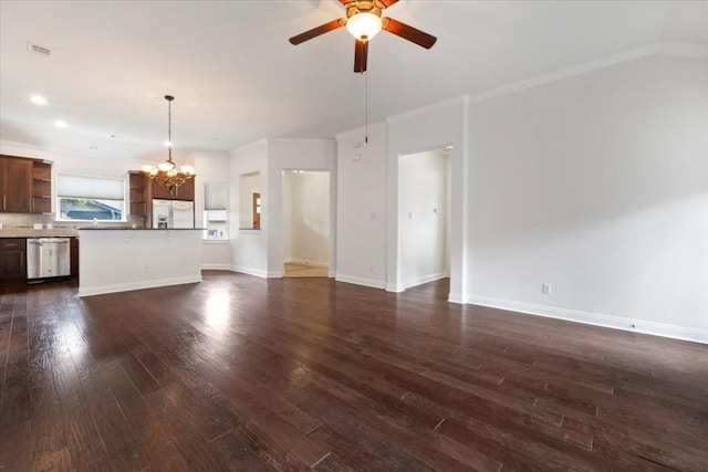 14501 Falcon Head Blvd Unit 43, Austin, TX 78738 - unfurnished living room featuring ceiling fan, a chandelier, dark wood-style floors, crown molding, and baseboards