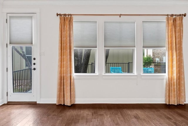 14501 Falcon Head Blvd Unit 43, Austin, TX 78738 - empty room featuring dark wood-style flooring, baseboards, and plenty of natural light