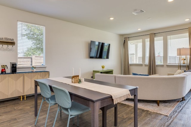 98 Barton Creek Ln, Hutto, TX 78634 - dining room with wood finished floors and recessed lighting