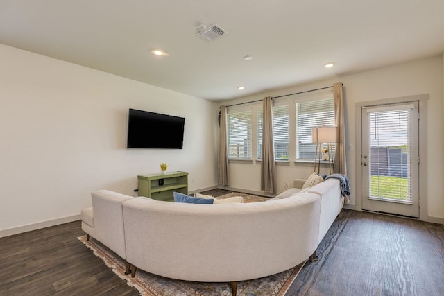 98 Barton Creek Ln, Hutto, TX 78634 - living area featuring dark wood finished floors, baseboards, and recessed lighting