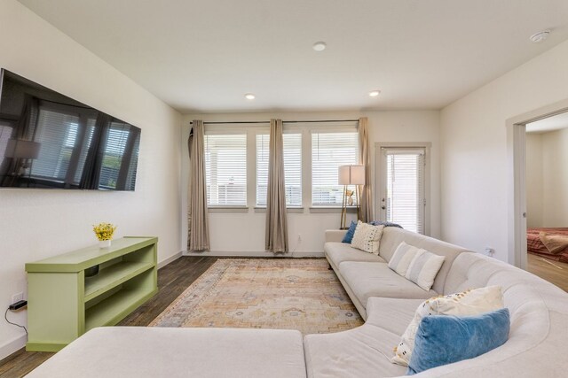 98 Barton Creek Ln, Hutto, TX 78634 - living room with dark wood-type flooring and recessed lighting