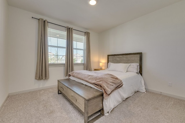 98 Barton Creek Ln, Hutto, TX 78634 - carpeted bedroom with baseboards