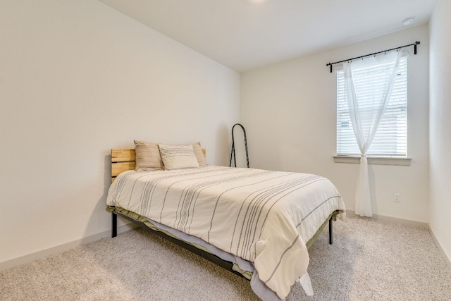 98 Barton Creek Ln, Hutto, TX 78634 - bedroom featuring carpet flooring and baseboards