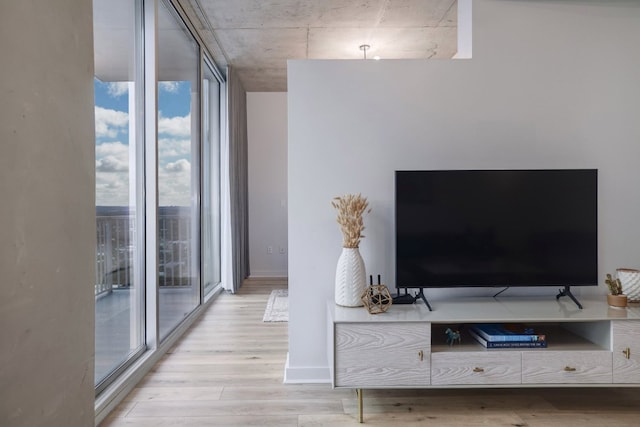 360 Nueces St Unit 3506, Austin, TX 78701 - living area with light wood-type flooring and expansive windows