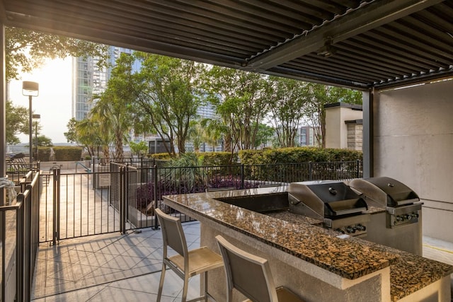 360 Nueces St Unit 3506, Austin, TX 78701 - view of patio / terrace featuring exterior kitchen