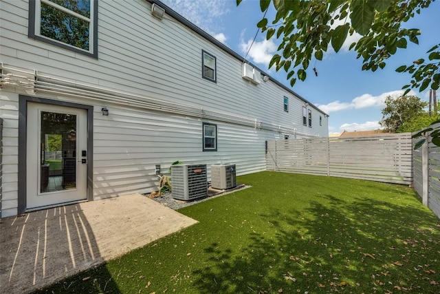 1200 E 52nd St Unit 105, Austin, TX 78723 - rear view of house featuring central air condition unit