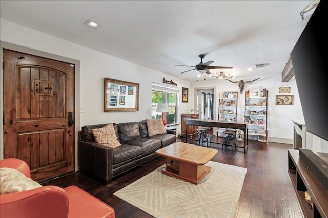 5701 Ave G, Austin, TX 78752 - living area featuring a ceiling fan and wood-type flooring