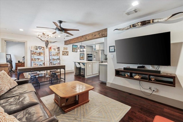 5701 Ave G, Austin, TX 78752 - living room featuring a ceiling fan, dark wood-style flooring, and recessed lighting