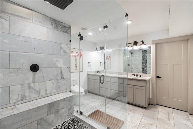 5701 Ave G, Austin, TX 78752 - full bath featuring a shower stall, vanity, and marble look tiles