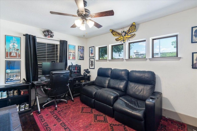 5701 Ave G, Austin, TX 78752 - home office with a ceiling fan and wood finished floors