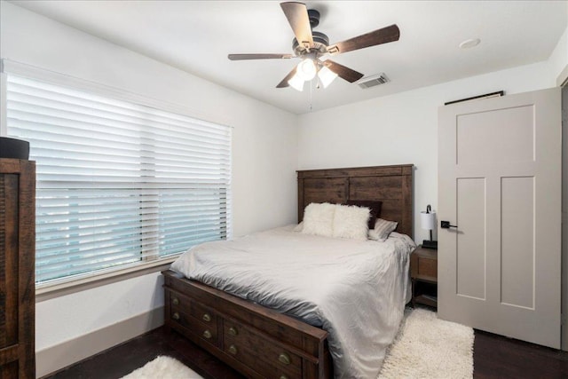 5701 Ave G, Austin, TX 78752 - bedroom with wood finished floors and ceiling fan