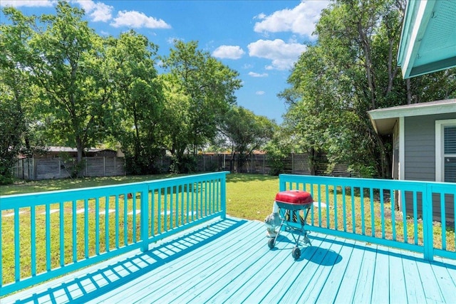 5701 Ave G, Austin, TX 78752 - wooden deck featuring a fenced backyard