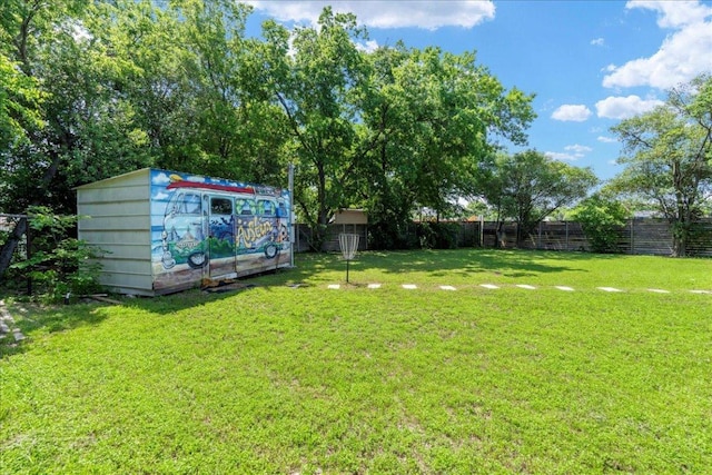 5701 Ave G, Austin, TX 78752 - fenced backyard with a storage unit