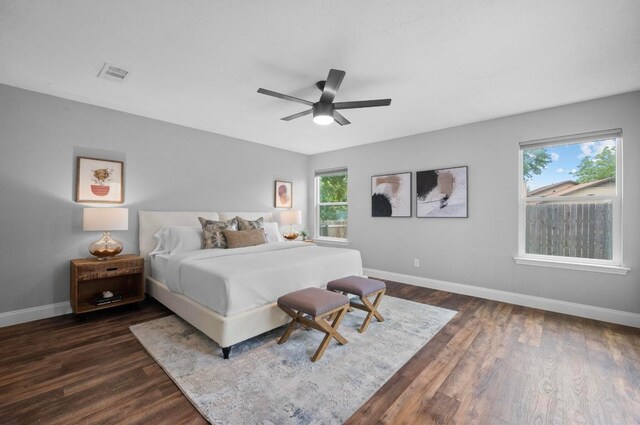 2405 Monarch Dr, Austin, TX 78748 - bedroom featuring baseboards, dark wood finished floors, and a ceiling fan