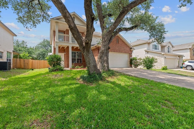 14404 Showdown Ln, Austin, TX 78717 - traditional-style house featuring brick siding, concrete driveway, a balcony, an attached garage, and central AC unit