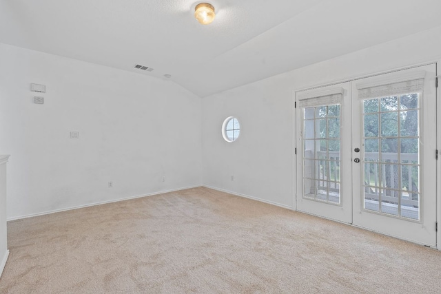 14404 Showdown Ln, Austin, TX 78717 - spare room with carpet, lofted ceiling, french doors, and baseboards