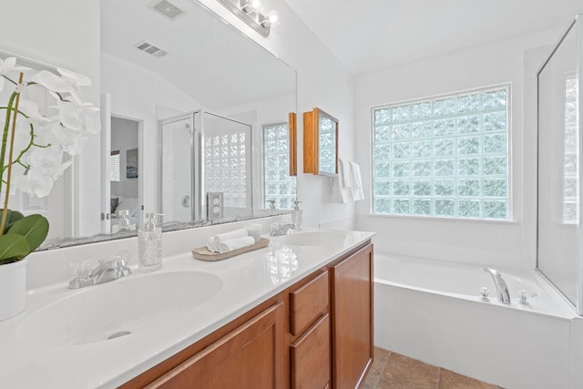 14404 Showdown Ln, Austin, TX 78717 - full bathroom featuring a garden tub, double vanity, and a shower stall