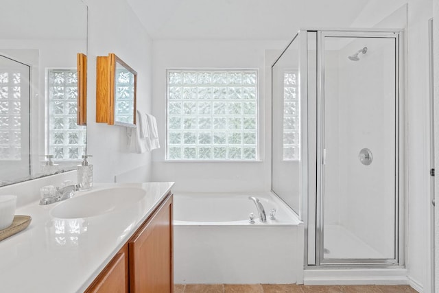 14404 Showdown Ln, Austin, TX 78717 - bathroom with vanity, a shower stall, and a bath