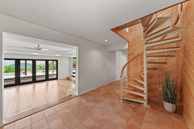 11105 Highview Dr, Belton, TX 76513 - empty room featuring stairs, a textured ceiling, light tile patterned floors, a ceiling fan, and recessed lighting