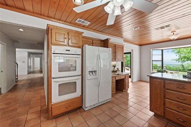 11105 Highview Dr, Belton, TX 76513 - kitchen with white appliances, wooden ceiling, light tile patterned floors, stone counters, and ornamental molding
