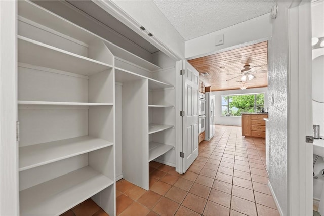 11105 Highview Dr, Belton, TX 76513 - spacious closet with light tile patterned floors