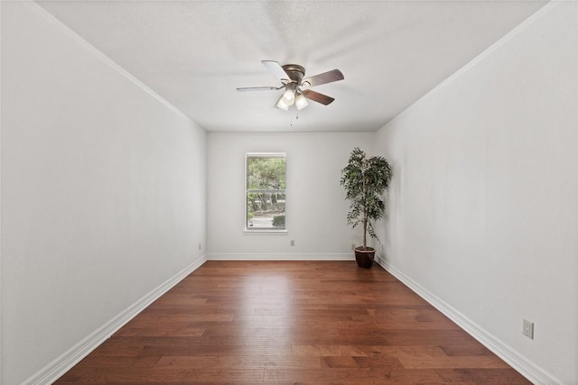 11105 Highview Dr, Belton, TX 76513 - spare room featuring a ceiling fan, dark wood-type flooring, and baseboards
